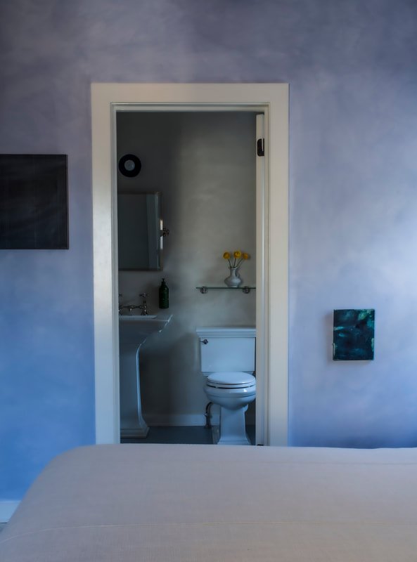 King Room seating and handcrafted furnishings at coastal retreat.