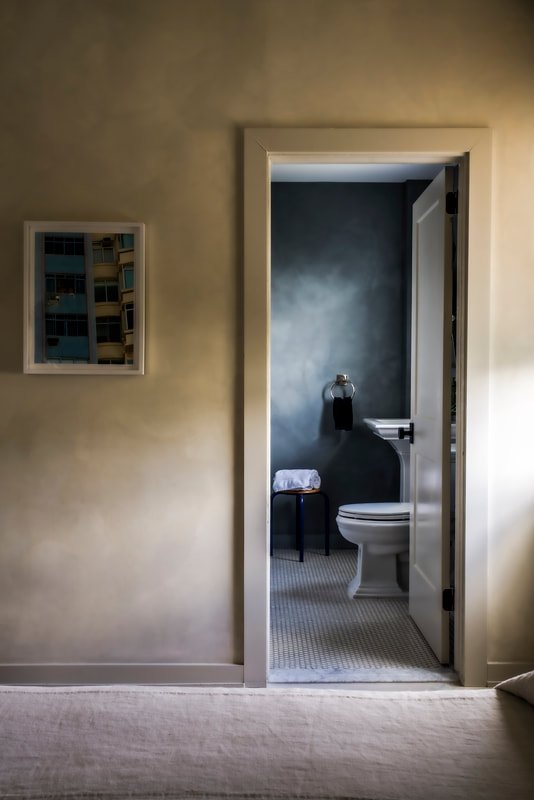 Mosaic-tiled bathroom in the Queen Room at Bradley Beach hotel.