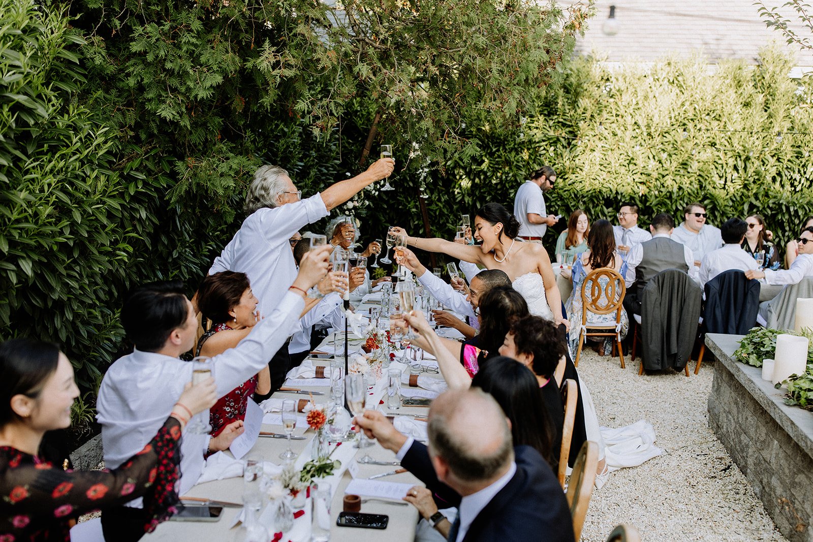 Private gathering arranged in the hotel’s outdoor space with refined styling and natural light